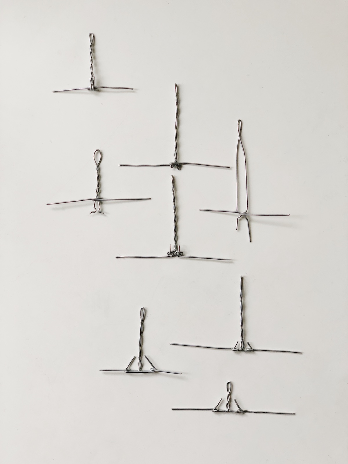 A variety of wire connection tests flat on a white table